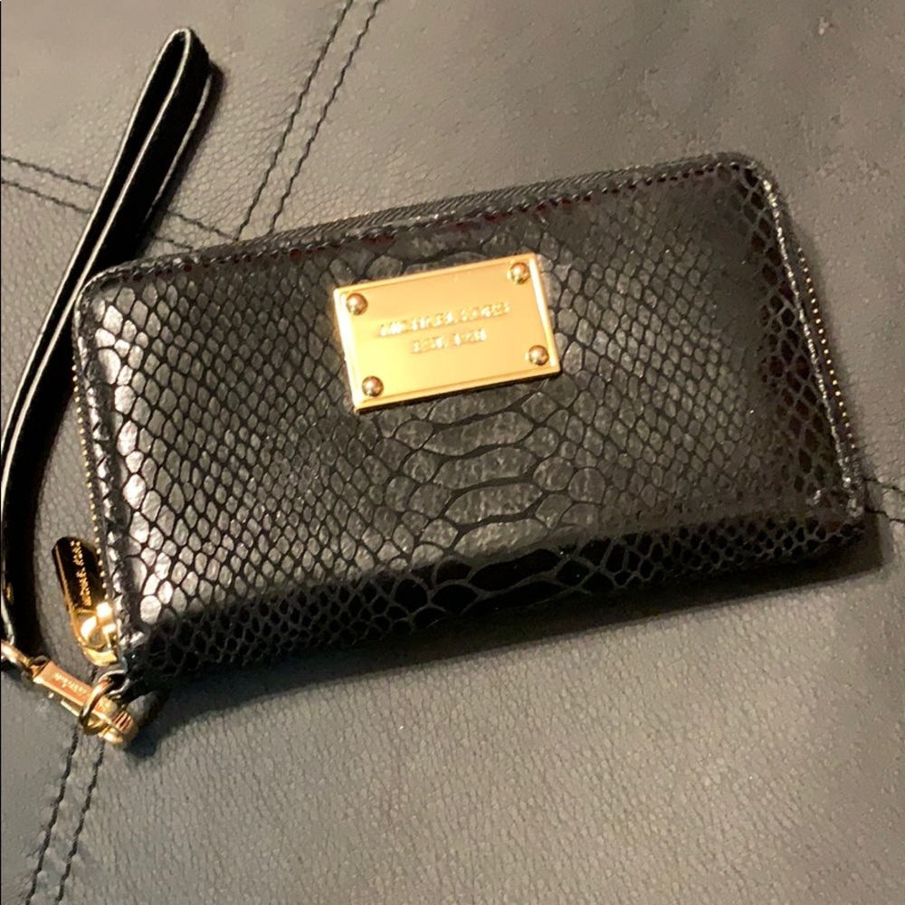 Michael Kors wrist wallet. Black snake skin.